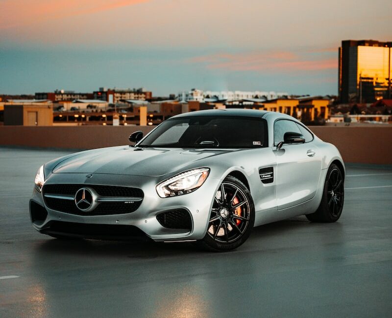 white porsche 911 on road during daytime